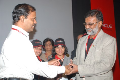 RECEIVING THE MEMENTO FROM MR. SUBHASH KHUNTIA IAS, JOINT SECRETARY, MINISTRY OF HUMAN RESOURCE DEVELOPMENT, SCHOOL EDUCATION, AND GOVERNMENT OF INDIA AT HOTEL OBEROI NEW DELHI ON 19 NOVEMBER 2009, FOR ACHIEVEMENTS ON THINKQUEST INTERNATIONAL COMPETITION 2009.